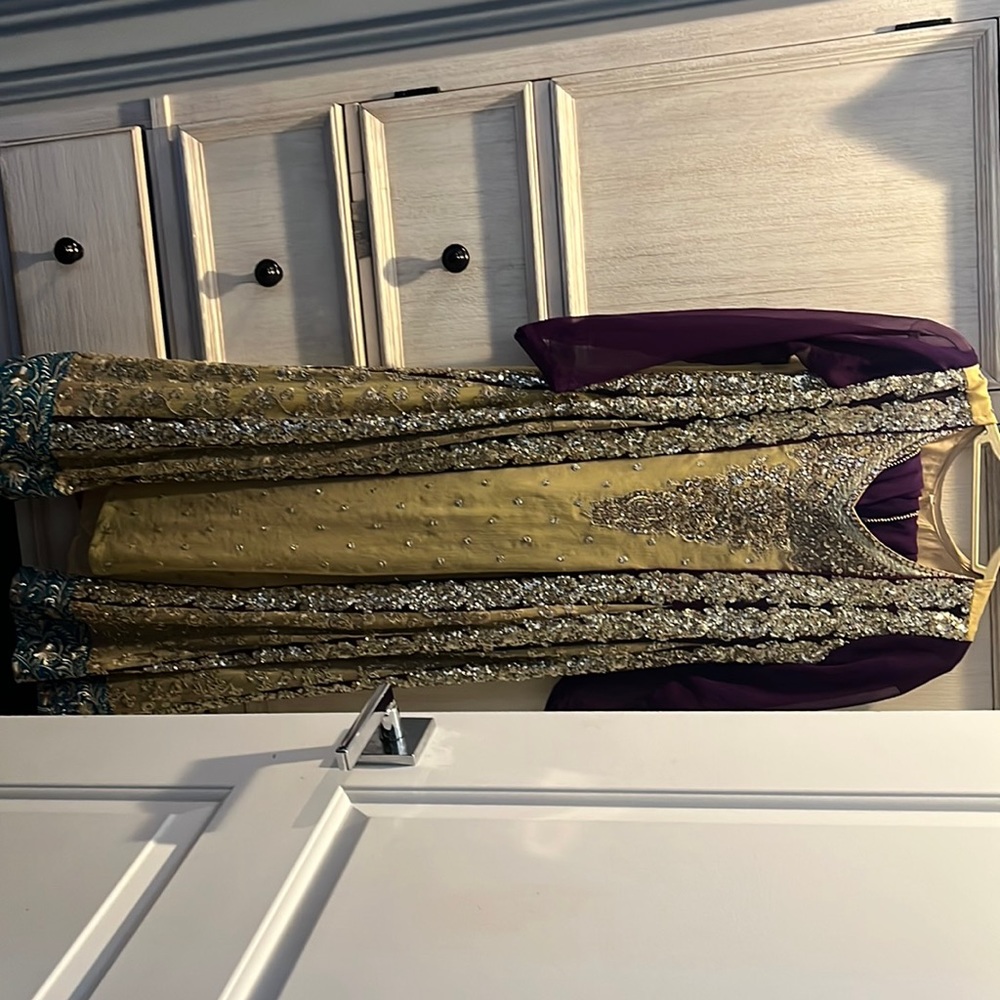 Purple dress with gold and silver work. Size small. Perfect for any occasion